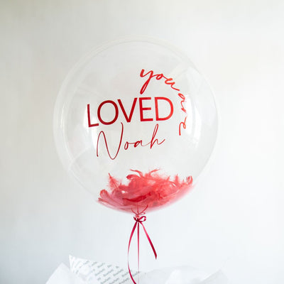 Red balloon with a personalised message